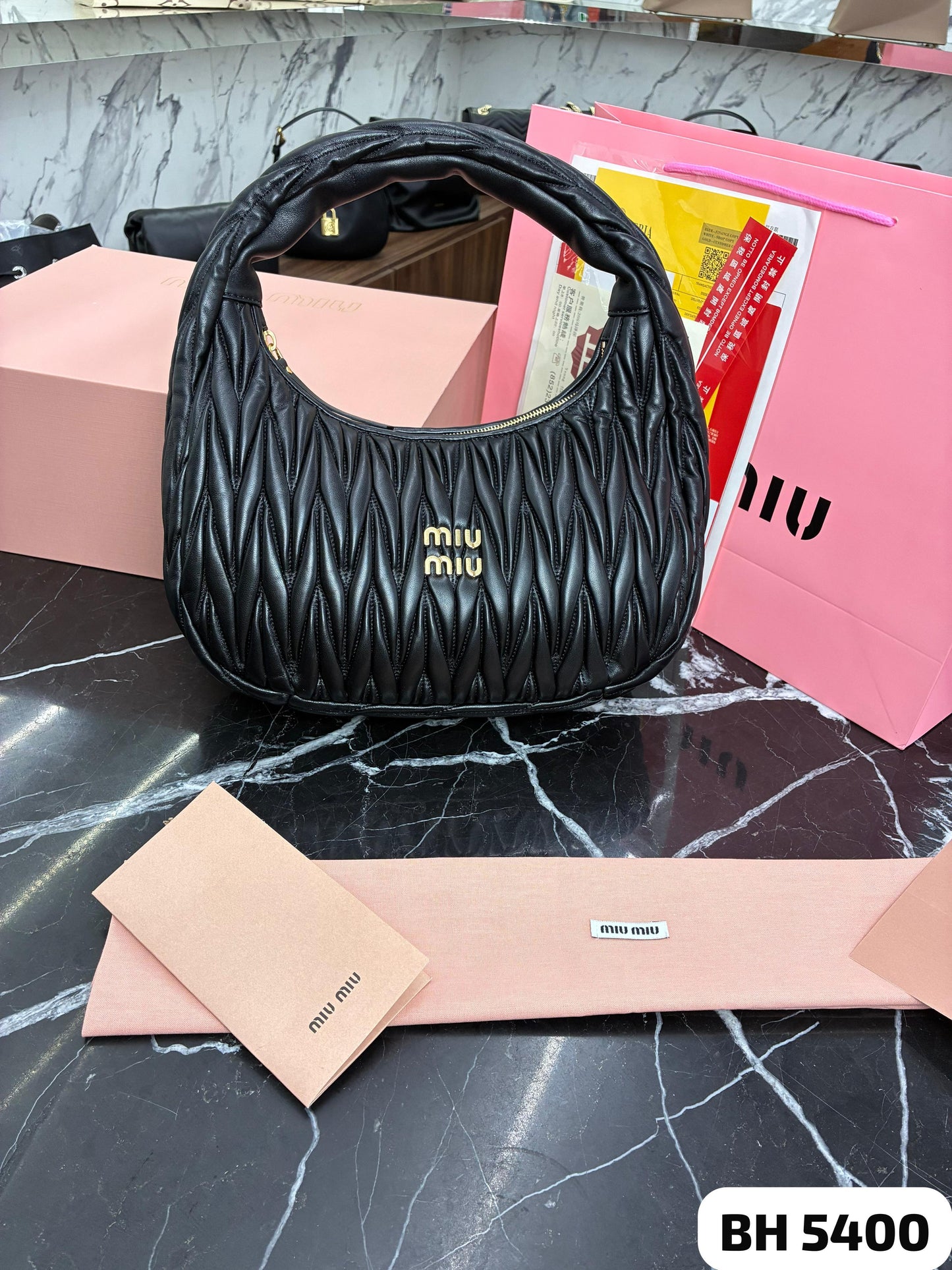 Bolso MIU MIU
MAXI
