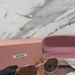 LENTE MIU MIU