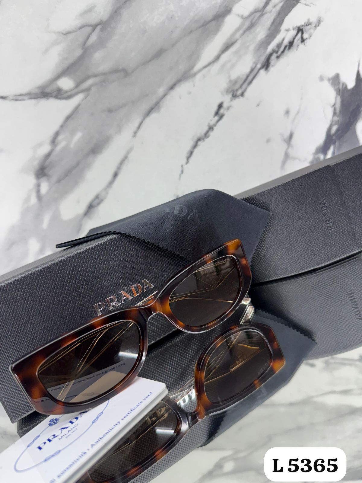 LENTE PRADA
