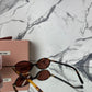 LENTE MIU MIU